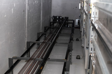 Inside elevator shaft and traction ropes