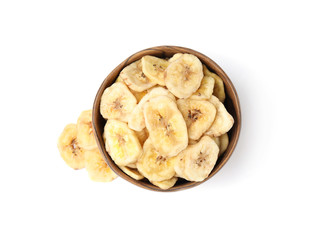 Wooden bowl with sweet banana slices on white background, top view. Dried fruit as healthy snack