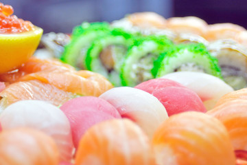 close up of sashimi sushi set with chopsticks and soy