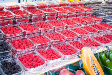 Raspberries on display at the farmers market in Paris