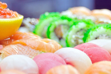 close up of sashimi sushi set with chopsticks and soy