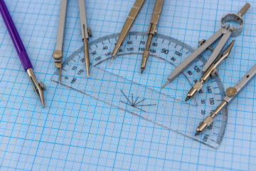 Draughtsmanship equipment with blue millimeter paper