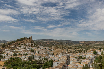 Fototapeta na wymiar A view of the church and town of Montefrio, Spain in summertime