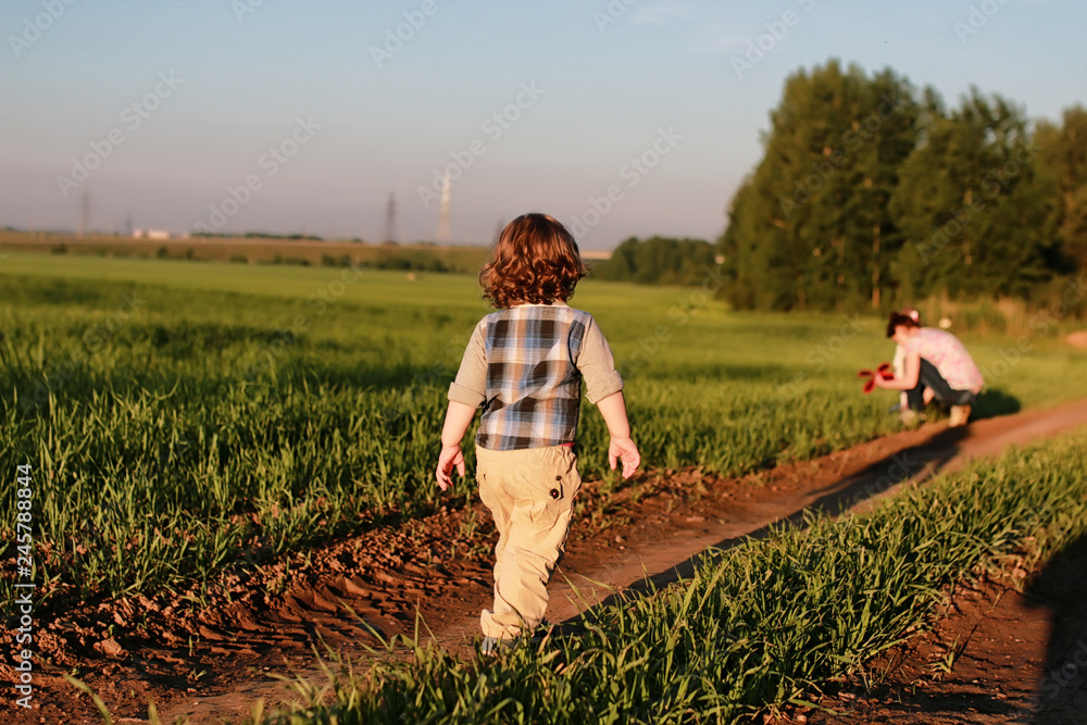 Wall mural Children outdoors on nature