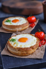 Buns filled with chhese melded butter and yolk, close view