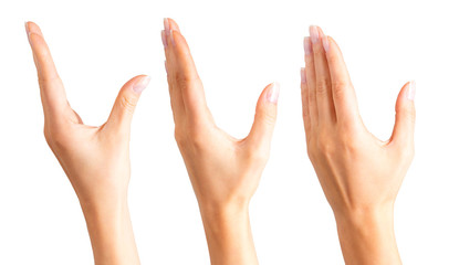 Set of women's hands taking or showing something