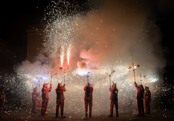 Typical Correfocs of Catalonia, a type of fireworks managed by men dressed as devils