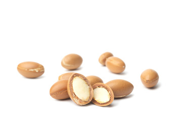 ARGAN SEEDS isolated on a white background. Argan oil and argan nuts concept