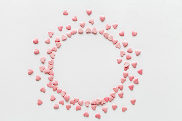 Obraz premium Valentine day background with pink hearts. Top view