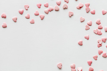 Valentine day background with pink hearts. Top view