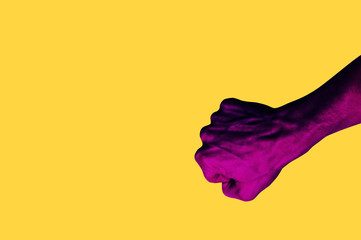 Isolated hand photo on yellow background. Pink hand collage style. Bright pop art template with space for text. Creative minimalistic backdrop. Poster, banner idea. Gestures with fingers