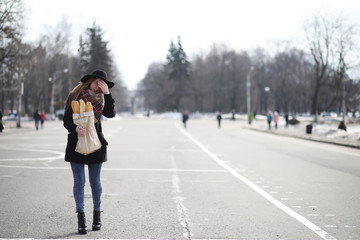 French woman with baguettes in the bag