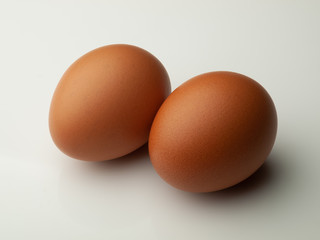 Two eggs isolated on white background