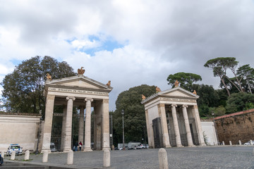 Monumental entrance to Villa Borghese, Rome, Italy, from Piazzale Flaminio near Porta del Popolo