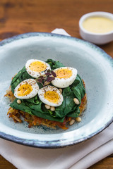 Quail Eggs florentine with spinach and rosti
