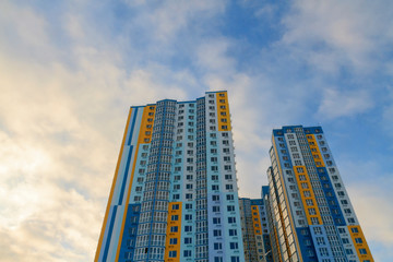 new building with colored walls goes high in the sky