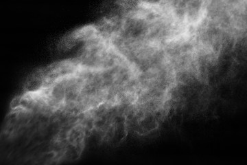 A stream of water and a cloud of drops