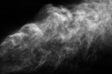 A stream of water and a cloud of drops