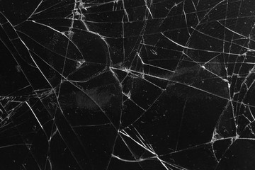 Broken glass on a black background, object background design texture