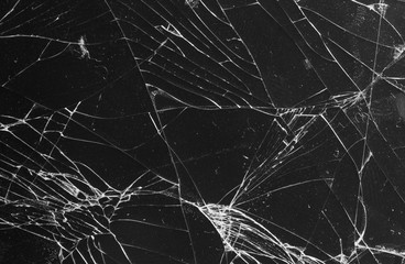 Broken glass on a black background, object background design texture