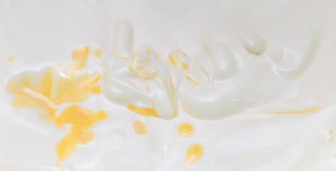 background of mixing white egg cream with butter