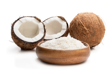 Fototapeta na wymiar Desiccated coconut in wooden bowl isolated on white