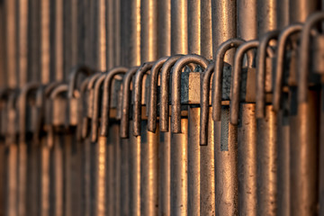 metal bars in a row at sunset