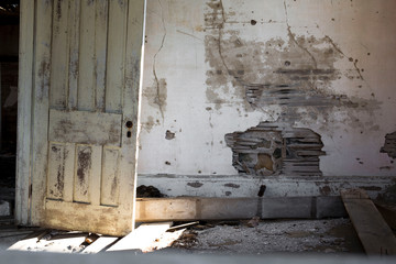 An abandoned building that is beginning to fall apart