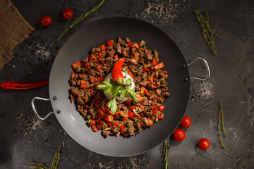 Sausage with sliced meat and vegetables