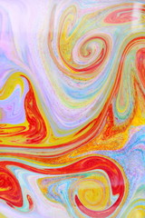 Fluid art from different colors. Multicolored background from paints on liquid. Bright pattern on liquid. Colored paint stains in style of pop art