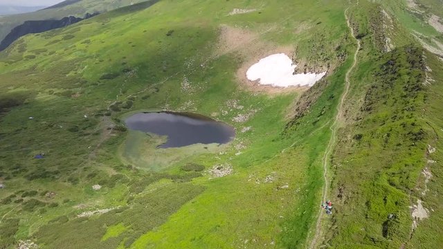 Bird's-eye view of the mountain landscape and highland lake Nesamovyte. Carpathians. Ukraine