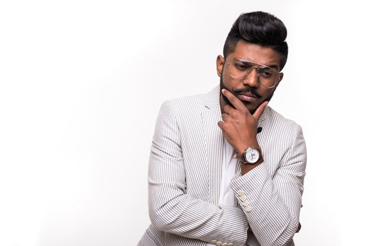 Young Indian hipster Confused Man Scratching His Chin isolated white background