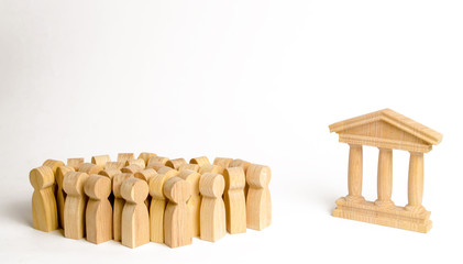 A crowd of people standing near the university building, government, bank, court. The protesters. Participation in protests against. Attraction of new customers, selection of the best of the best.