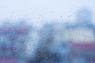 Water drops on window after rain, natural texture as background 