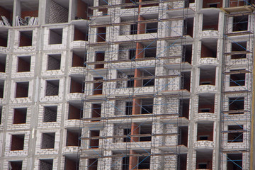 close up fragment of a house under construction without front wall