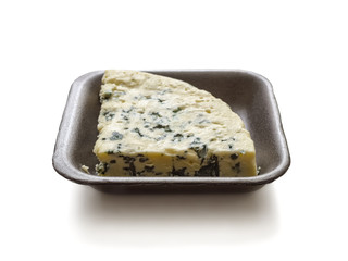 Gorgonzola cheese in a foam plate