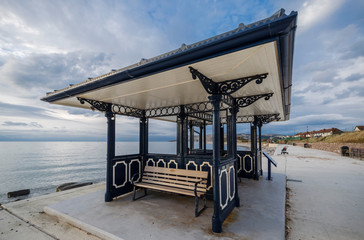 A seaside promenade shelter