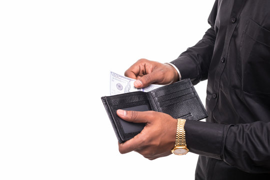 Businessman saving money. Close up man carrying a wallet in hand, the dollar, finance accounting concept