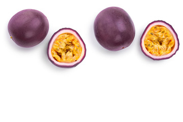 Two whole passion fruits and a half isolated on white background with copy space for your text. Isolated maracuya. Top view. Flat lay