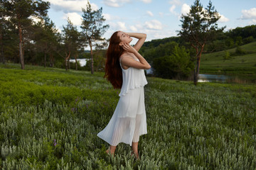  girl in a dress in nature
