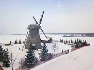 Authentic wooden windmill at winter season