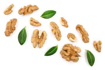 peelled Walnuts with leaves isolated on white background with copy space for your text. Top view. Flat lay