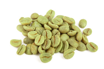 green coffee beans isolated on white background close up