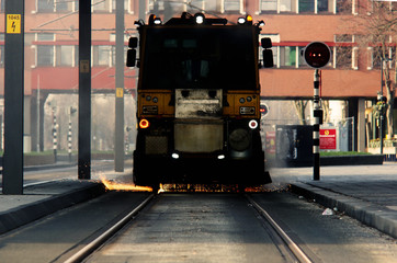 Contruction work on a tram line looks like the tram is derailing with a lot of sparks, fire coming...