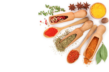 mix of spices in wooden scoop isolated on a white background with copy space for your text. Top...