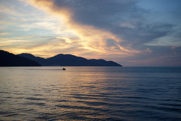 Fototapeta premium Jet Ski Spraying Water at Sunset