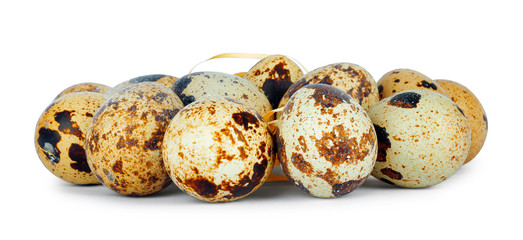 Fresh quail eggs on  isolated background