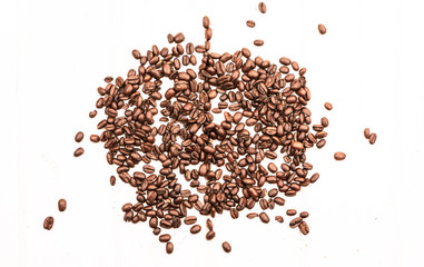 Fried brown coffee beans are scattered