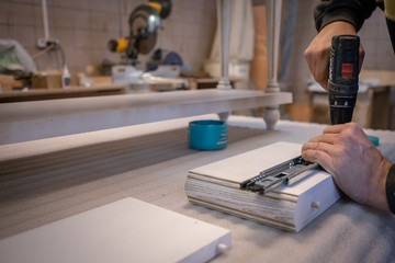 Making furniture from wood. Work carpenter. Carpentry tools.