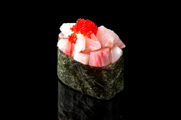 Gunkan Maki Sushi  with perch (tai) and tobiko caviar on black background. Sushi menu. Japanese food.